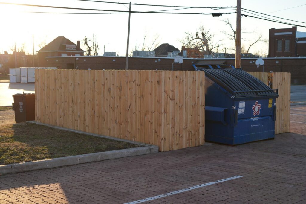 Cedar picket dumpster enclosure with steel posts, St. Louis MO
