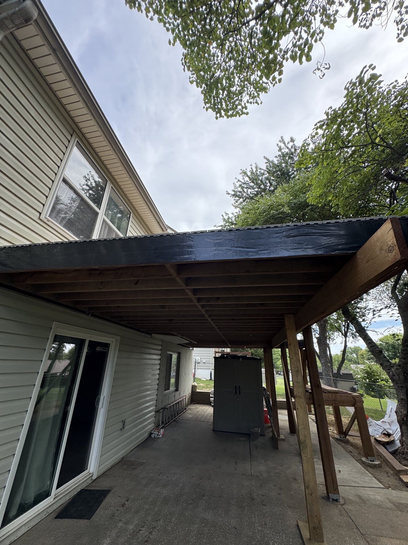 Rim joist fully wrapped in protective membrane on a covered deck we are building in St. Louis