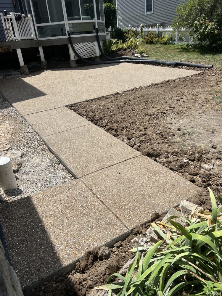 Exposed aggregate concrete patio and walkway