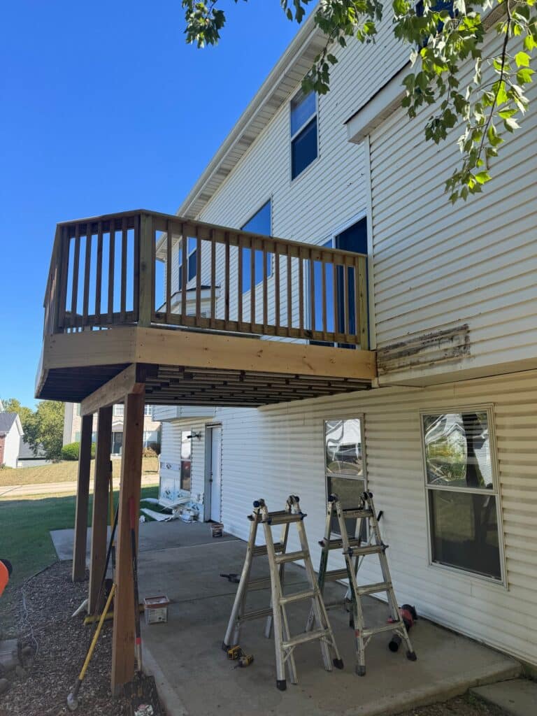 After: new rim boards and railing on an elevated deck
