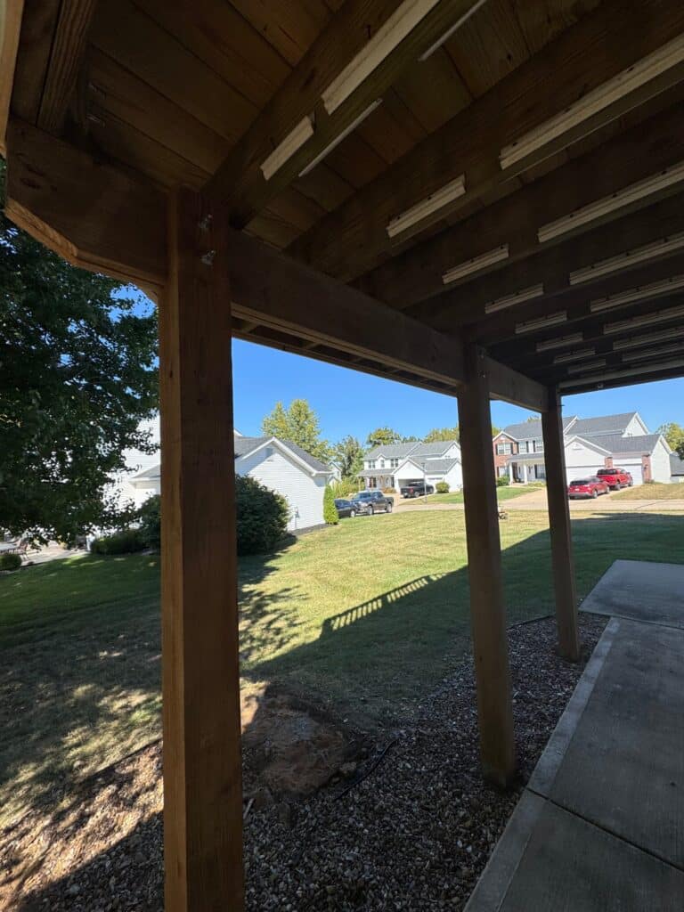 Deck posts and beam under a revamped elevated deck