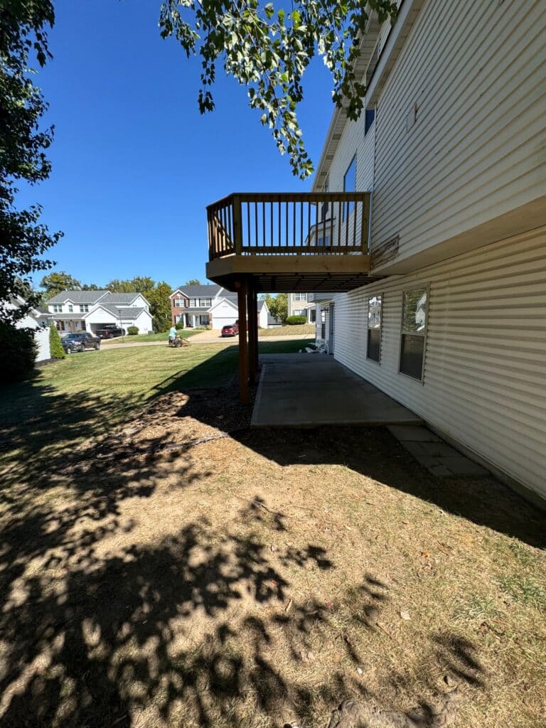 New deck boards along the house on a revamped deck